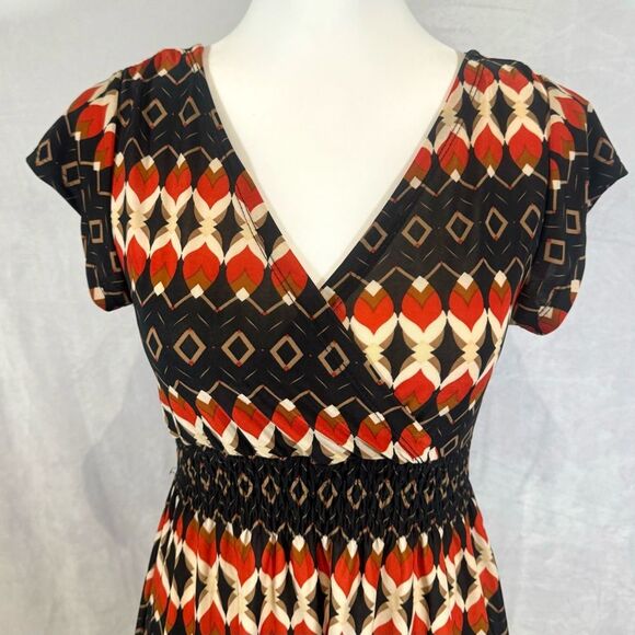 Cristina Love black and burnt orange abstract print smocked dress size medium - Picture 2 of 5